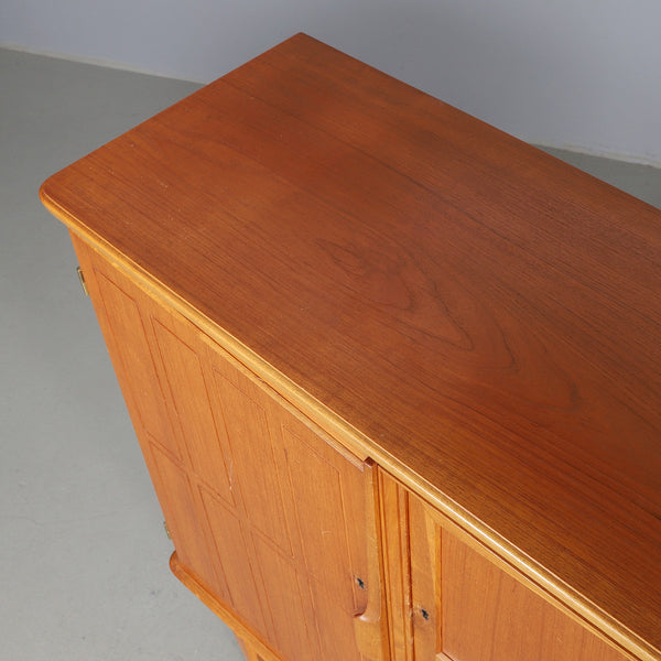 SIDEBOARD, teak, second half of the 20th century.*