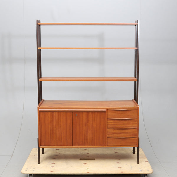 TEAK BOOK SHELF WITH 2 DOORS AND 4 DRAWERS, 1960s.