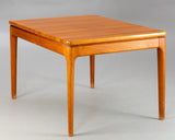 Extendable solid teak rectangular dining table with 2 self stored solid teak leaves, architect-Niels Bach