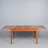 NIELS BACH. Glostrup, SOLID TEAK dining table with leaves, teak, 1970s, Denmark.
