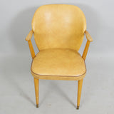 ARMCHAIR, beech / artificial leather, mid-20th century.*